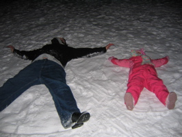 Making snow angels with papi.