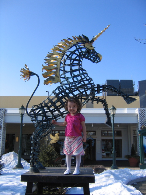 She loved the unicorn, and was not scared at all the stand up there all by herself. 