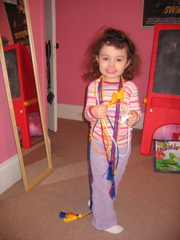 She still loves to play with my graduation cords... 