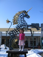 She loved the unicorn, and was not scared at all the stand up there all by herself. 