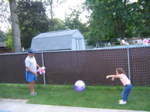 Novi and grandpa played catch.