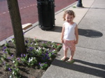 She really liked getting her picture taken by flowers.