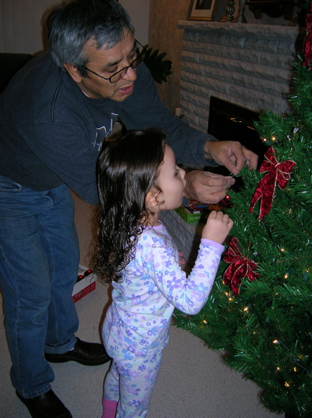 Then she helped decorate the tree.