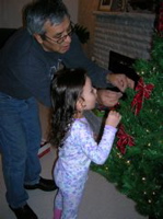 Then she helped decorate the tree.