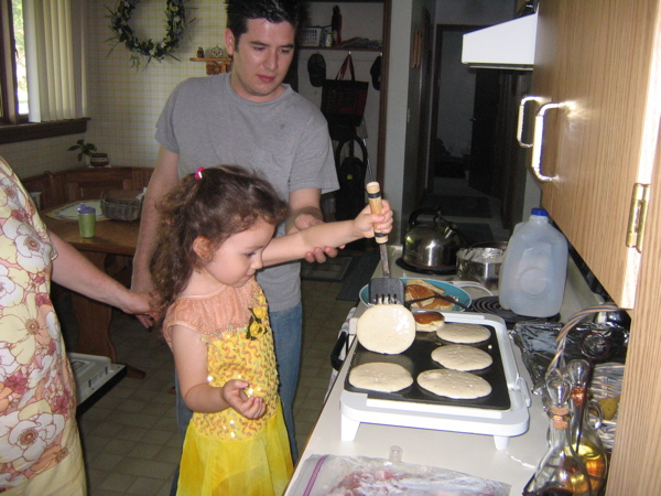 She wore that dance costume all day. Even making breakfast.