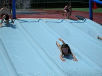 Down the slide... head first!