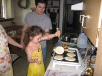 She wore that dance costume all day. Even making breakfast.