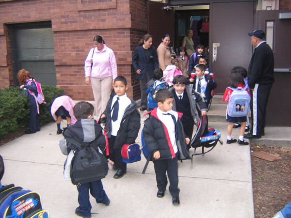 After school the kids running out.. schools out!