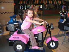 Went to the mall for food and she road the bikes
