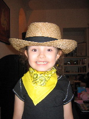 Before heading home... she wanted to dress up like a cowgirl...