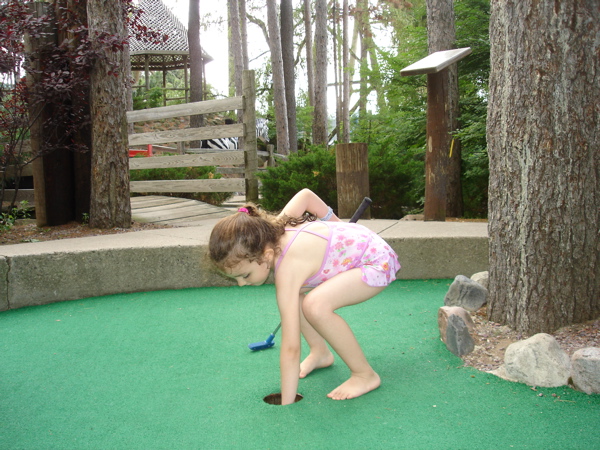 Twice she got a hole-in-one! 