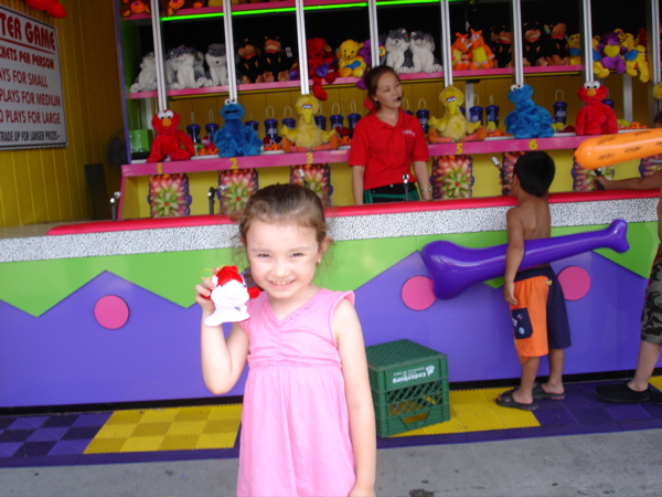 Her little dolphin stuffed animal prize. 