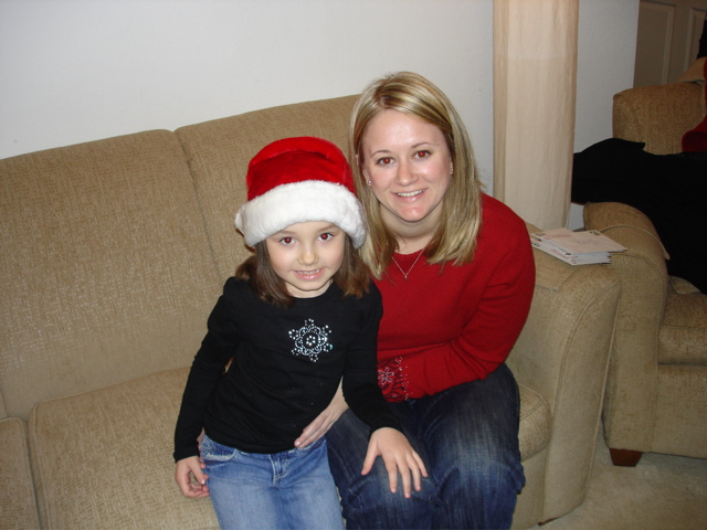 Sunday morning she put on her Santa hat and it was gift time.