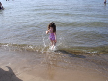 Water was still cold... and she still wanted to jump in.