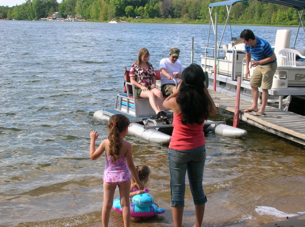 Miguel and Kate explored the lake on the paddle boat. 