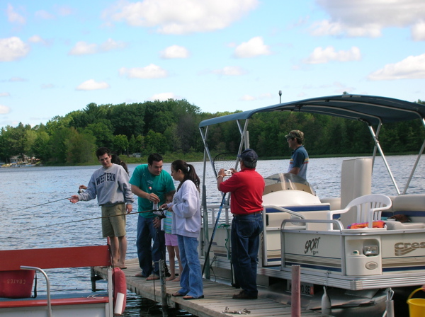 The dock had a lot of fishing action. 