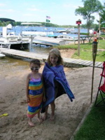 With her second cousin Courtney on her final day of swimming.