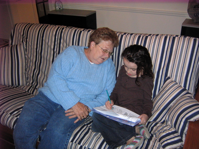 Reading with grandma.