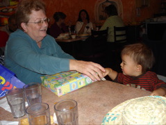 Grandma helping with gifts.