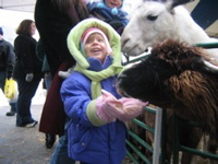 Valerie feeding the pets.