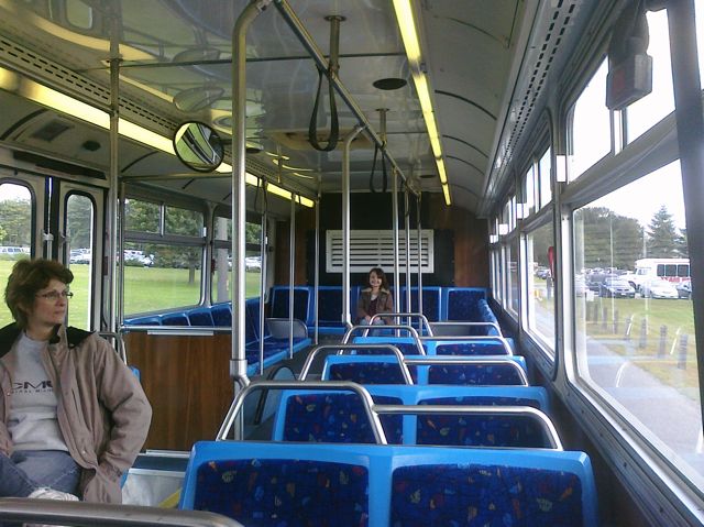 Novi didn't get to go a game this year.... but here she is riding the shuttle with Anita!