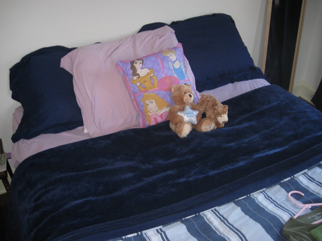 She made her bed, she loves her Disney pillow, thanks grandma Coates! 