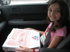 Yes, yes you can get a pizza on a road trip stop. 