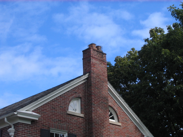 Chimney and attic windows.