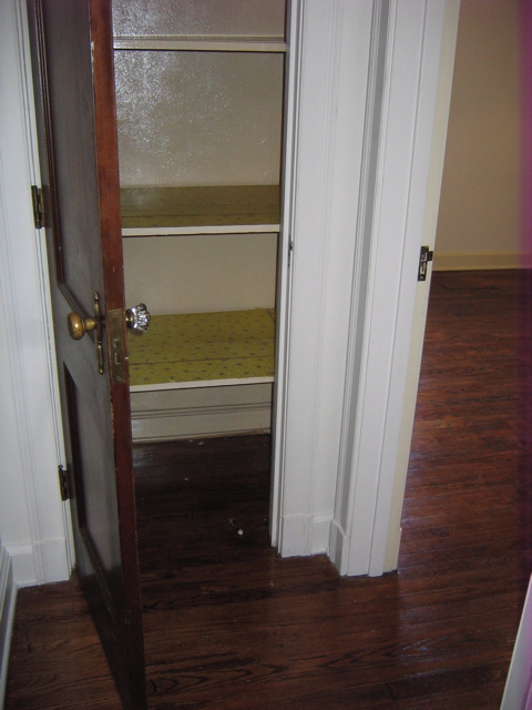 Linen closet in hallway - deep shelves. 