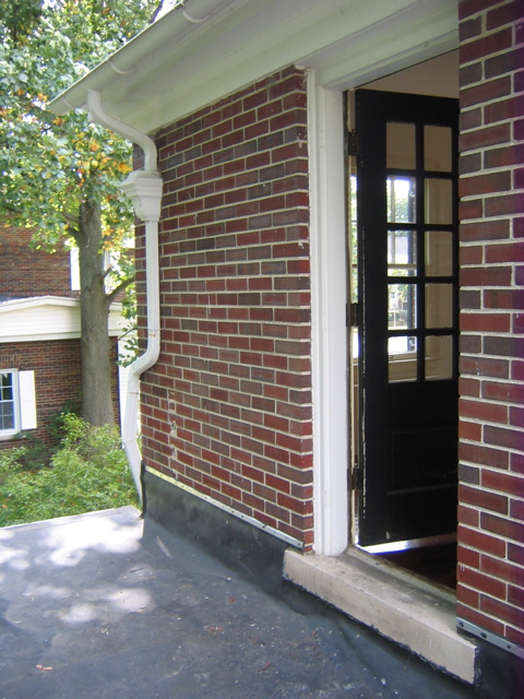 Door to flat roof from Master bedroom. 