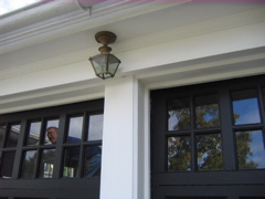 Garage doors and we love the old light fixtures.