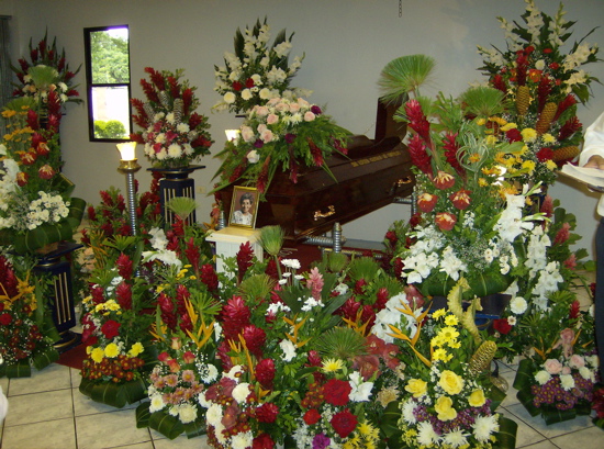 By the next morning you could barely see the casket there were so many flowers.