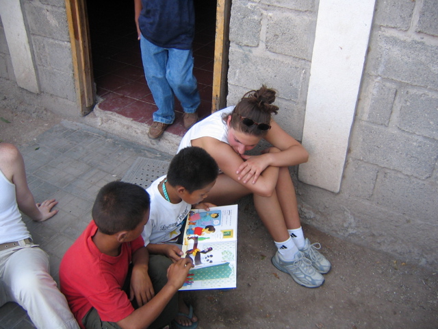 Mari reading with the kids. 