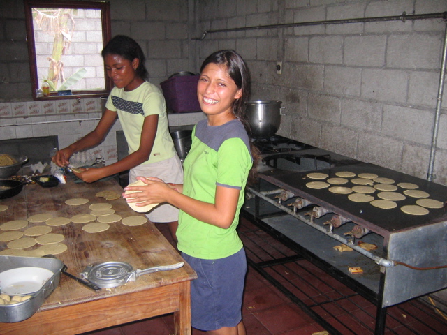 The girls make the food for the entire mission. 