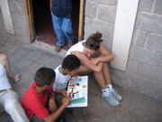 Mari reading with the kids. 
