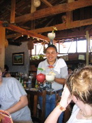 The waitress brought the drinks on her head. 