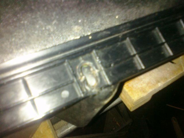 One of the screws wouldn't come off when I removed it, so I slit the plastic to pull it off. 