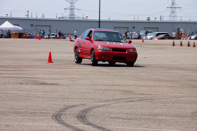 Going through the slalom... yep I am on three wheels. 