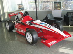 Race car at the Tire Rack building.