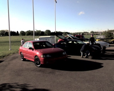 Me next to my competition. The Celica runs in my class, he ended up first in our class, and first overall for the day. 